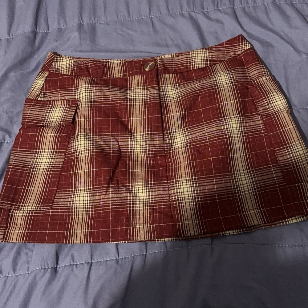 A mini plaid skirt from forever 21
It’s red and supper cute! NEVER WORN